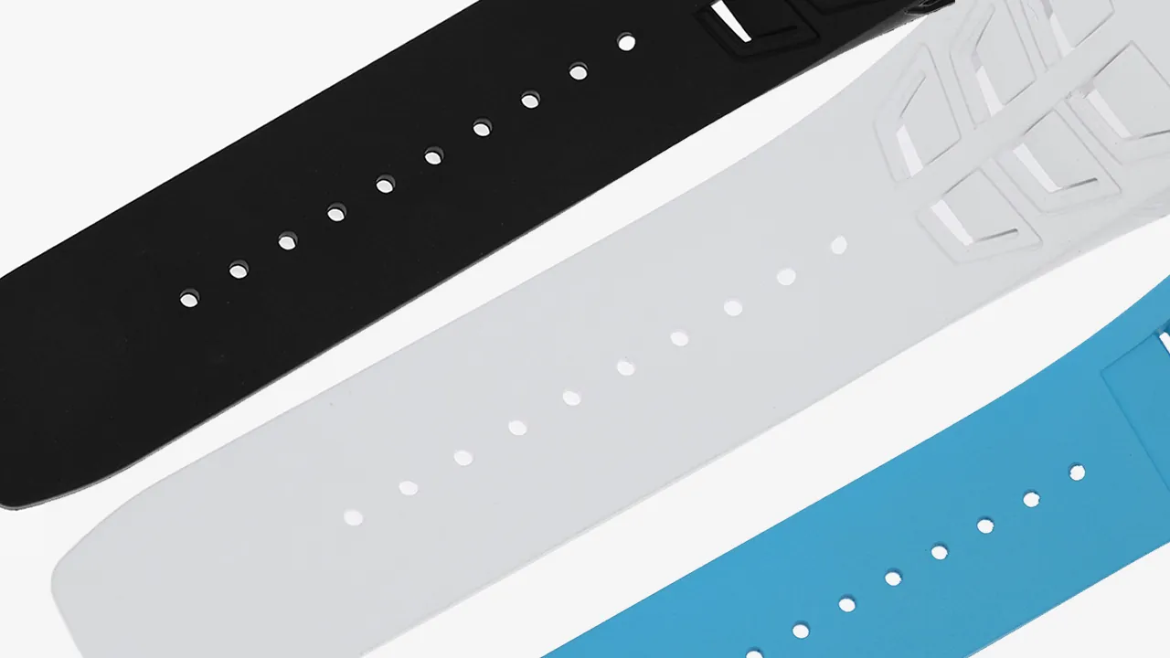 Richard Mille RM055 replica rubber straps in black, white and blue colors, showing different strap options 