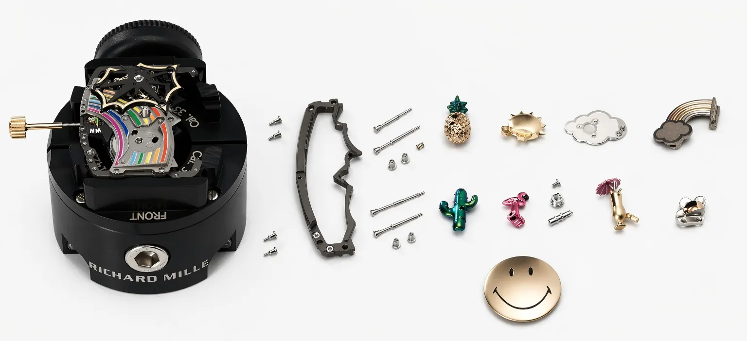 RM 88 Smiley automatic tourbillon movement disassembled showing skeleton structure and decorative components including cactus, pineapple and rainbow elements