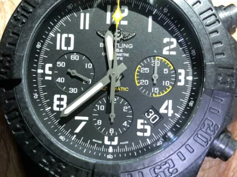 Close-up dial shot of a large Breitling aviation chronograph replica built with premium replicated Breitlight composite casing. Breitlight is Breitling’s exclusive patented carbon polymer composite crafted for professional aviation and sports tool watches, distinct from conventional metal watch cases. Top-tier Breitling super clones adopt matching composite formulas and compression molding techniques to mirror the texture, weight and physical characteristics of authentic Breitlight. This high-tech material weighs 5.8x less than 316L stainless steel and 3.3x lighter than titanium, eliminating the bulky heavy feel of large 44/45mm steel chronographs for all-day comfortable wear. Additionally, replicated Breitlight delivers industrial-grade practical perks: fully non-magnetic, skin-friendly hypoallergenic construction, complete corrosion resistance, and UV fading stability. It avoids rust, oxidation, and green skin discoloration even with long-term sweaty outdoor and water exposure.