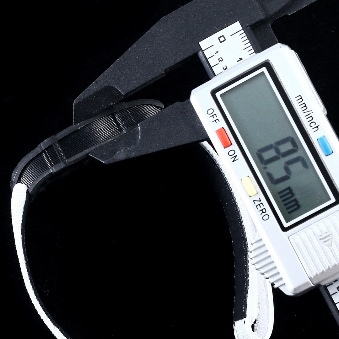 Richard Mille RM27-05 black carbon fiber case white strap flying tourbillon watch thickness measurement detail view