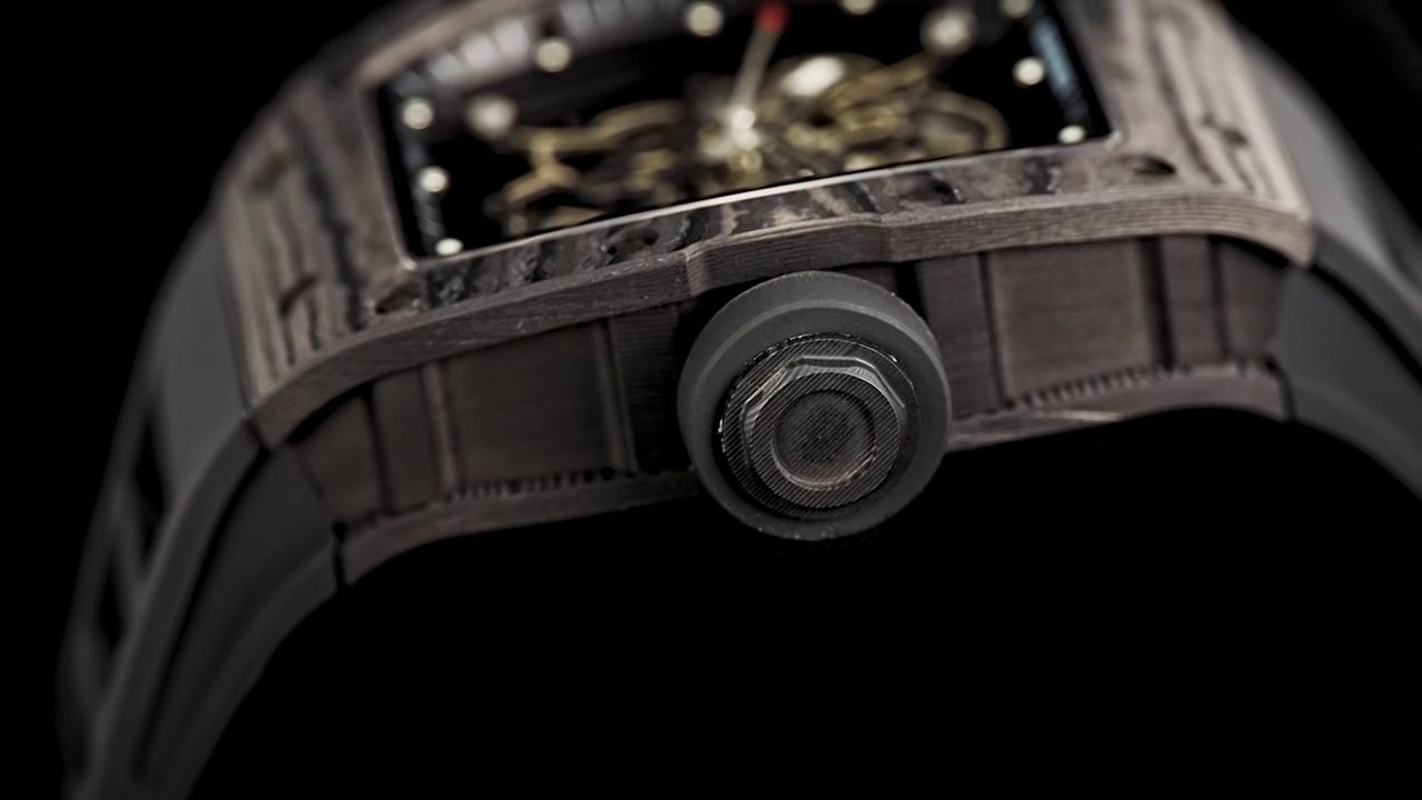 Richard Mille RM55 Skeleton Tourbillon Carbon Fiber Case Blue Dial Black Strap Sport Watch Crown Side Detail View