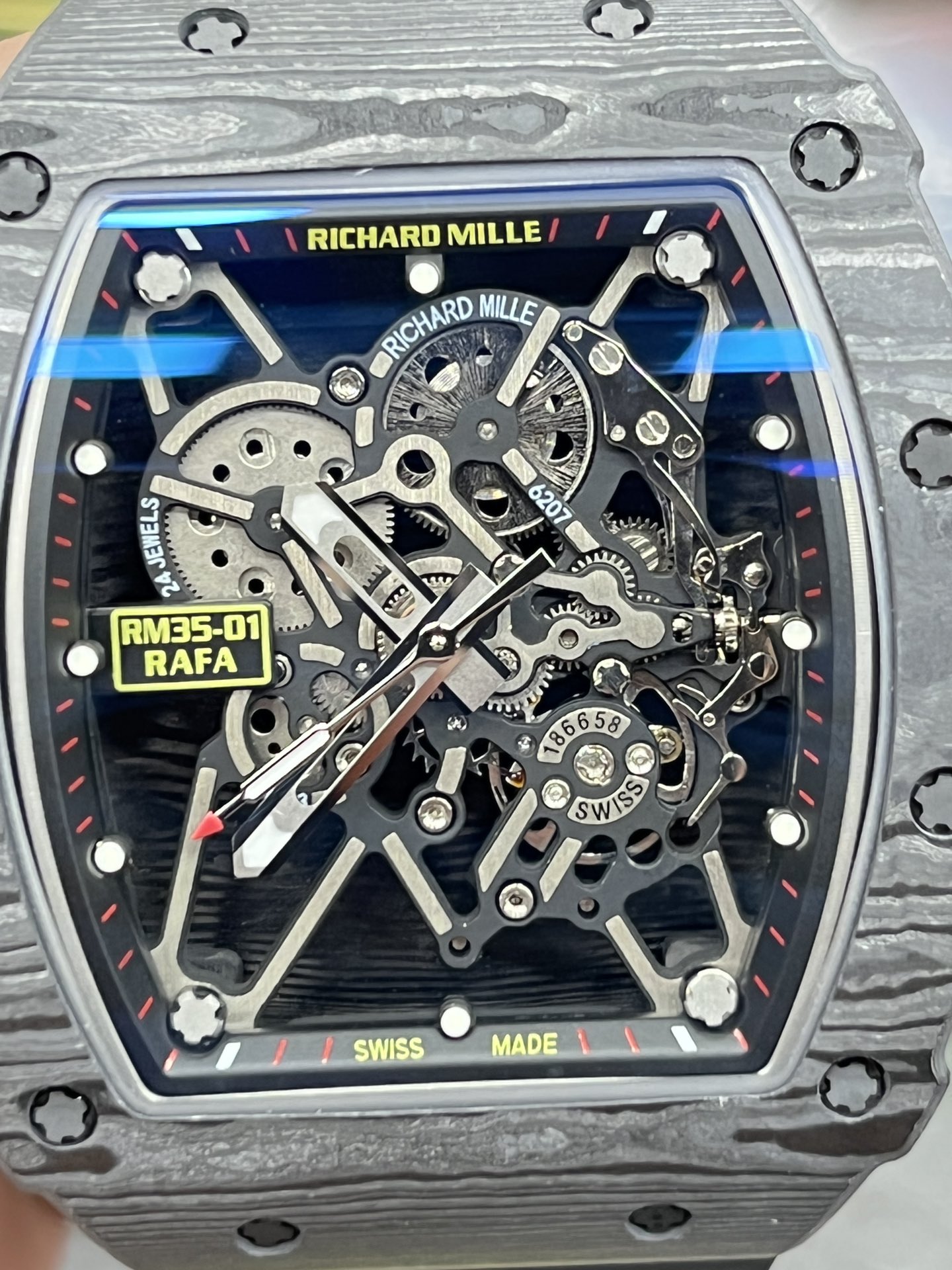 Richard Mille RM35-01 Rafa carbon fiber case black skeleton dial red markers skeleton movement dial close-up detail view