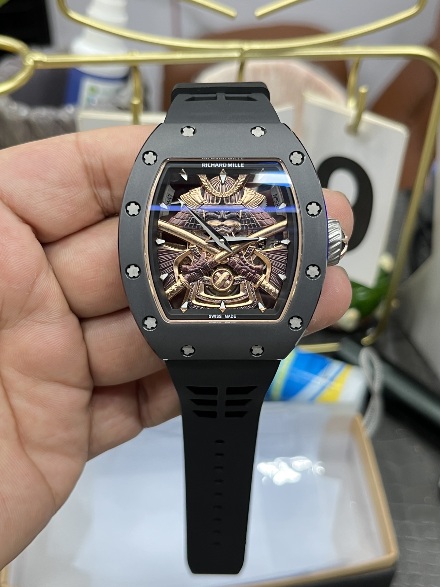 Richard Mille RM Series RM47 black case black rubber strap samurai armor tourbillon watch handheld front view