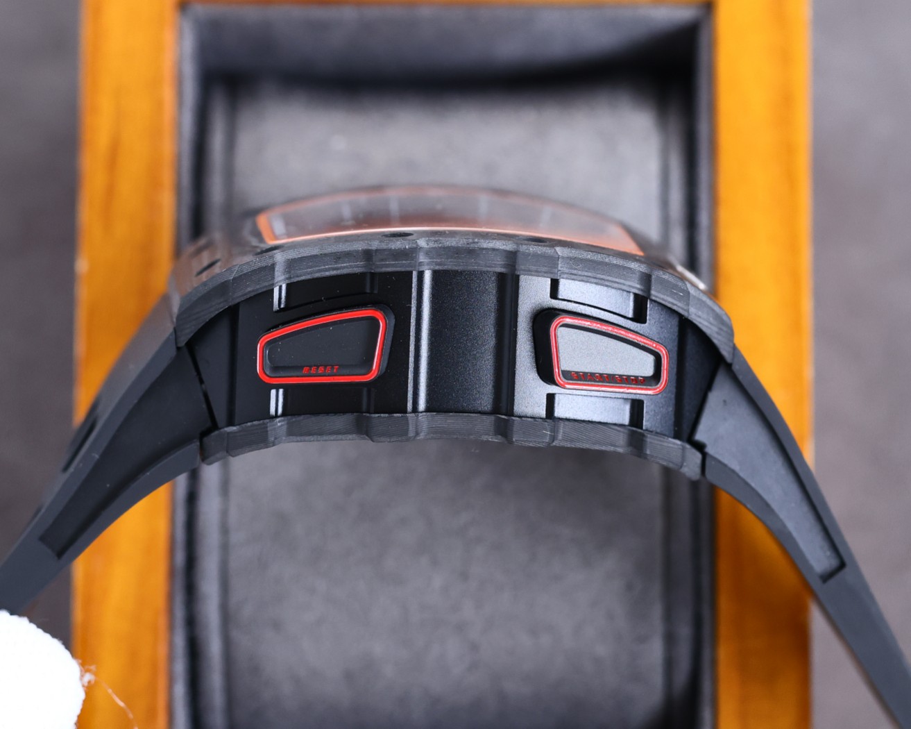 Richard Mille RM50-03 McLaren F1 Tourbillon Carbon Case Black Orange Accents Black Rubber Strap Side Pushers Detail View
