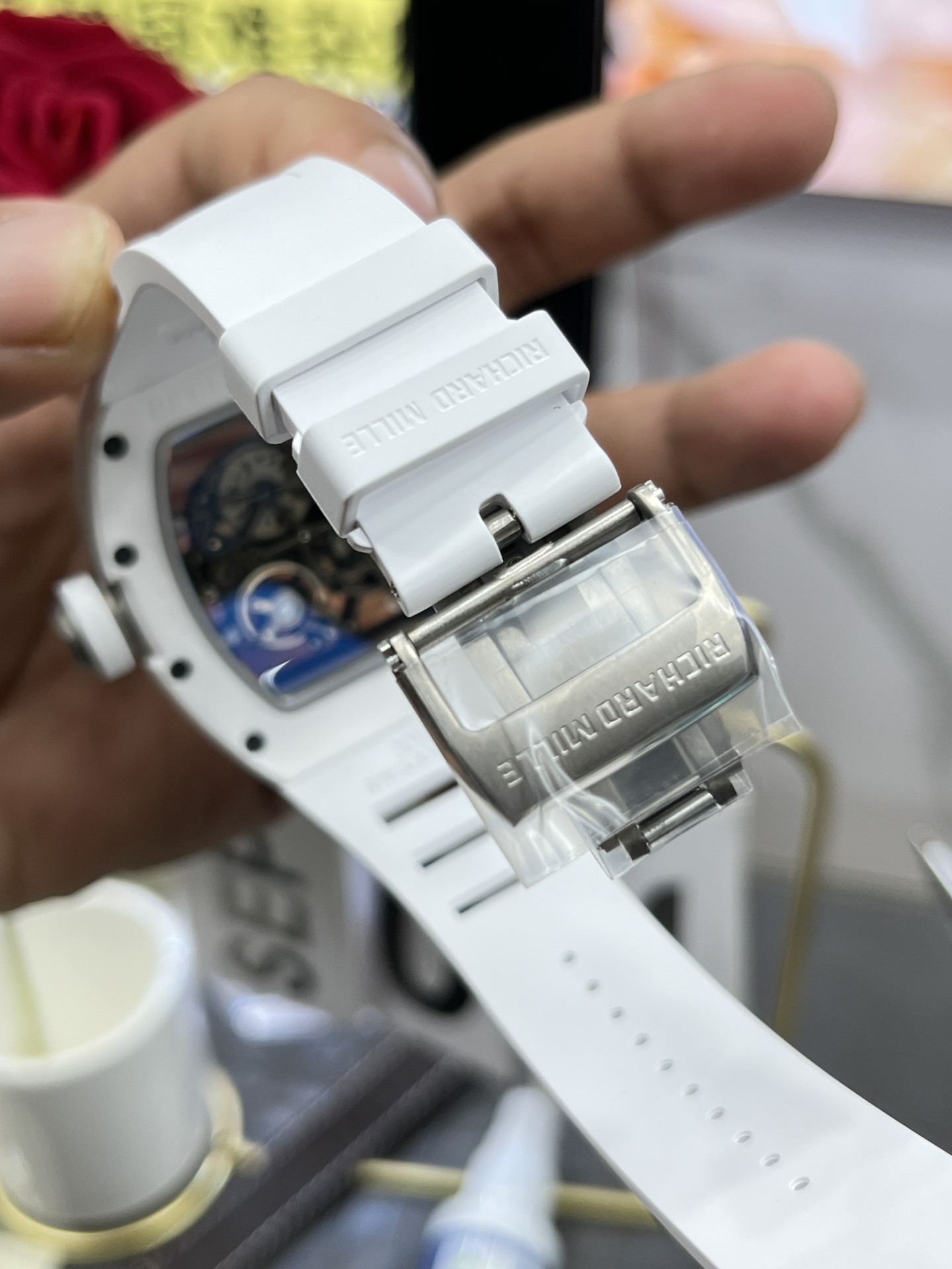 Richard Mille RM055 BBR white ceramic case white rubber strap deployant clasp engraving detail view