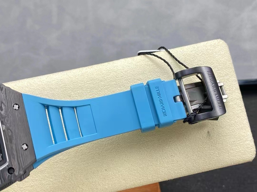 Richard Mille RM Series RM35-02 black NTPT carbon fiber case with blue rubber strap and black buckle side detail view