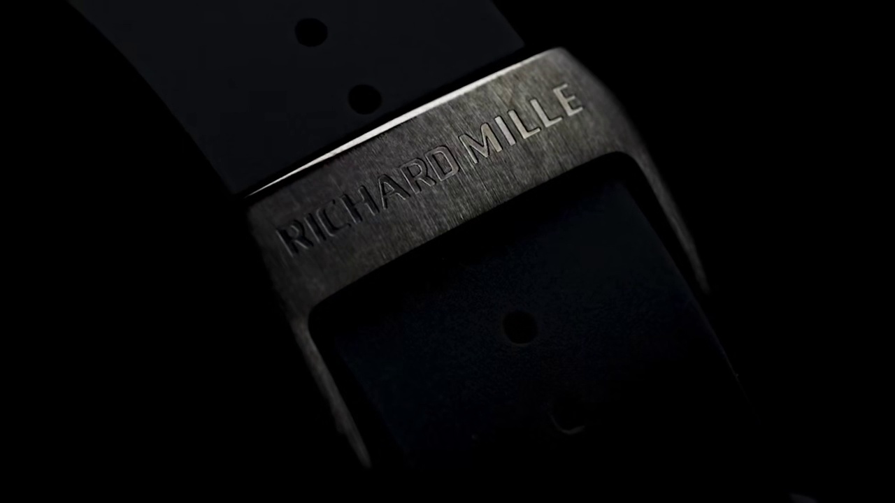 Richard Mille RM55 Skeleton Tourbillon Carbon Fiber Case Blue Dial Black Strap Sport Watch Buckle Detail View