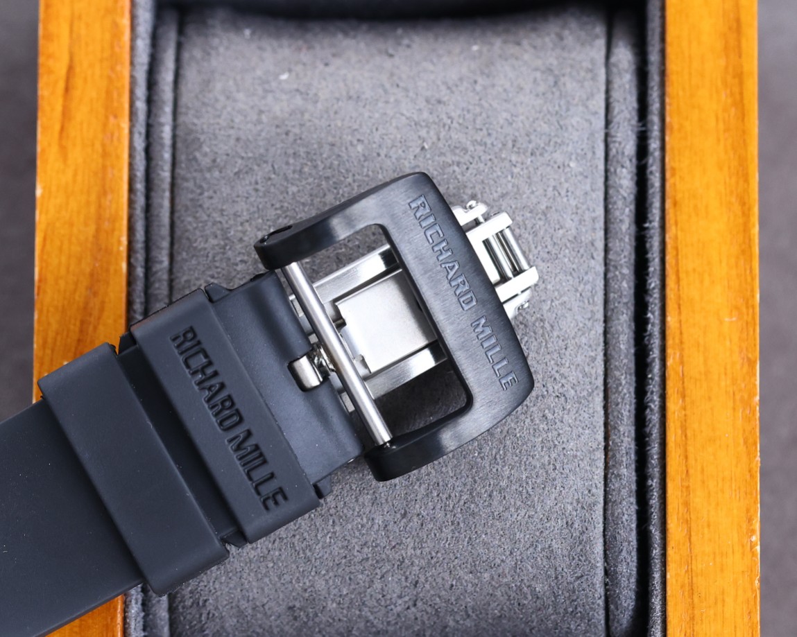 Richard Mille RM50-03 McLaren F1 Tourbillon Carbon Case Black Orange Accents Black Rubber Strap Clasp Detail View