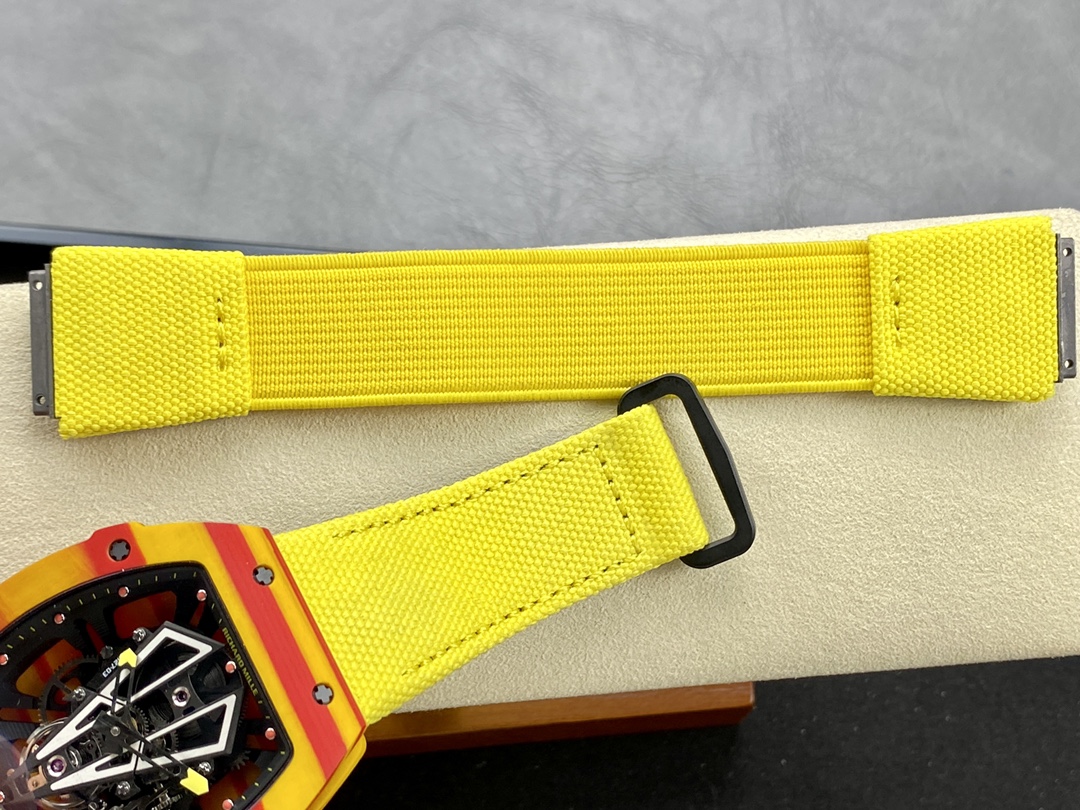Richard Mille RM27-03 red yellow carbon fiber case yellow strap tourbillon watch strap detail view