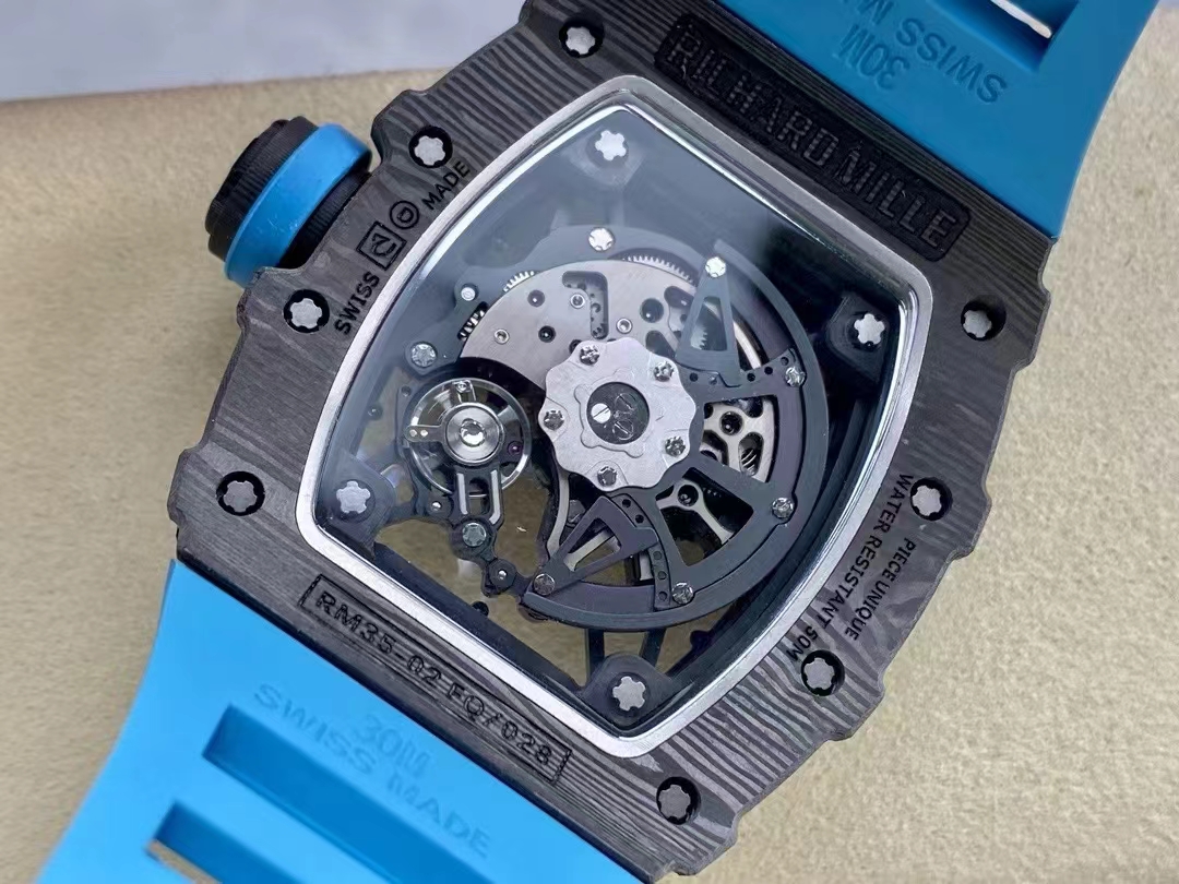 Richard Mille RM Series RM35-02 black NTPT carbon fiber case with blue rubber strap transparent caseback movement detail view