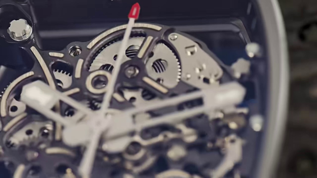 Richard Mille RM55 Skeleton Tourbillon Carbon Fiber Case Blue Dial Black Strap Sport Watch Movement Detail View