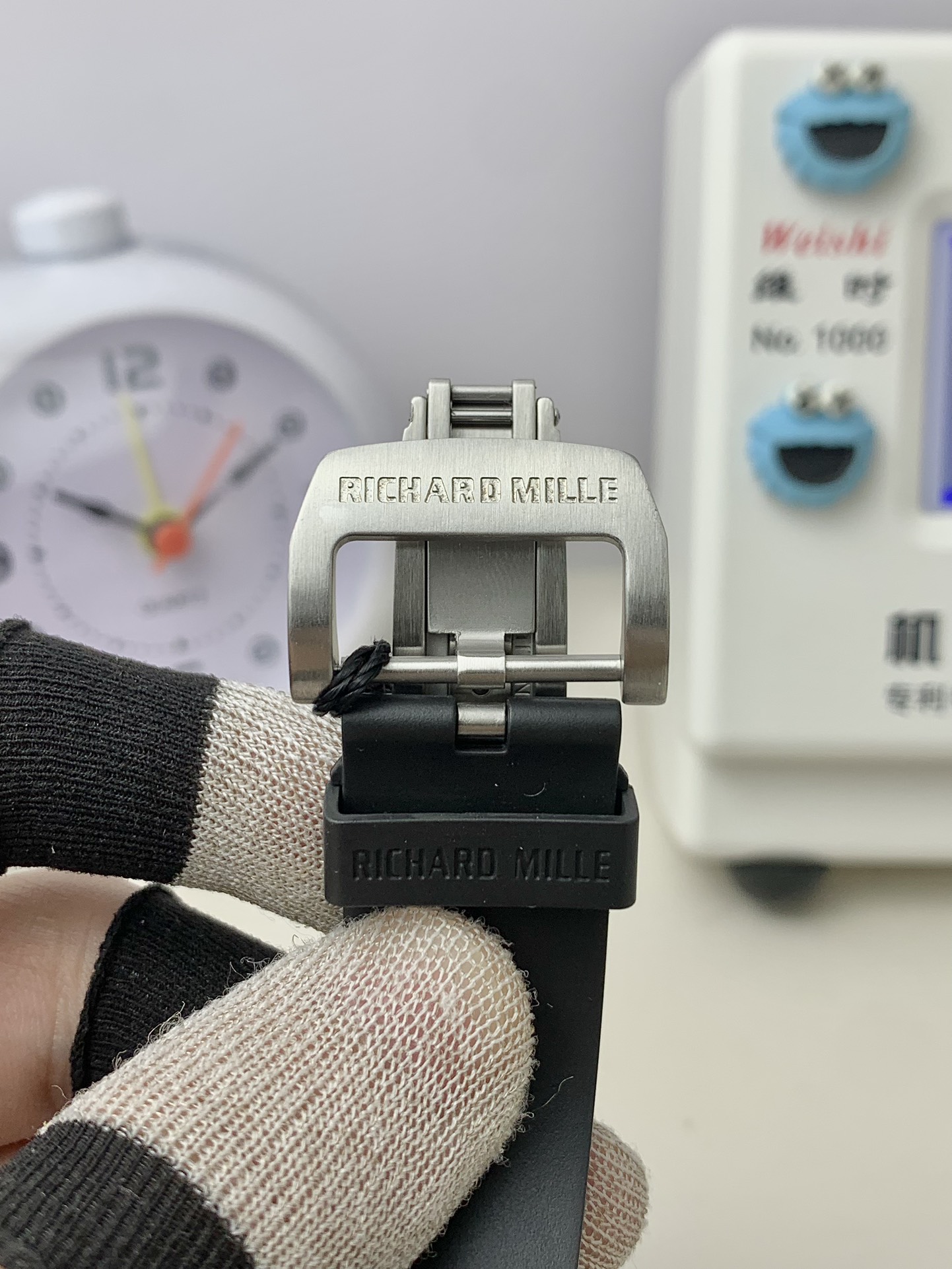 Richard Mille RM35 Series RM35-03 Black Strap Silver Clasp Detail Close-up View Luxury Watch Buckle