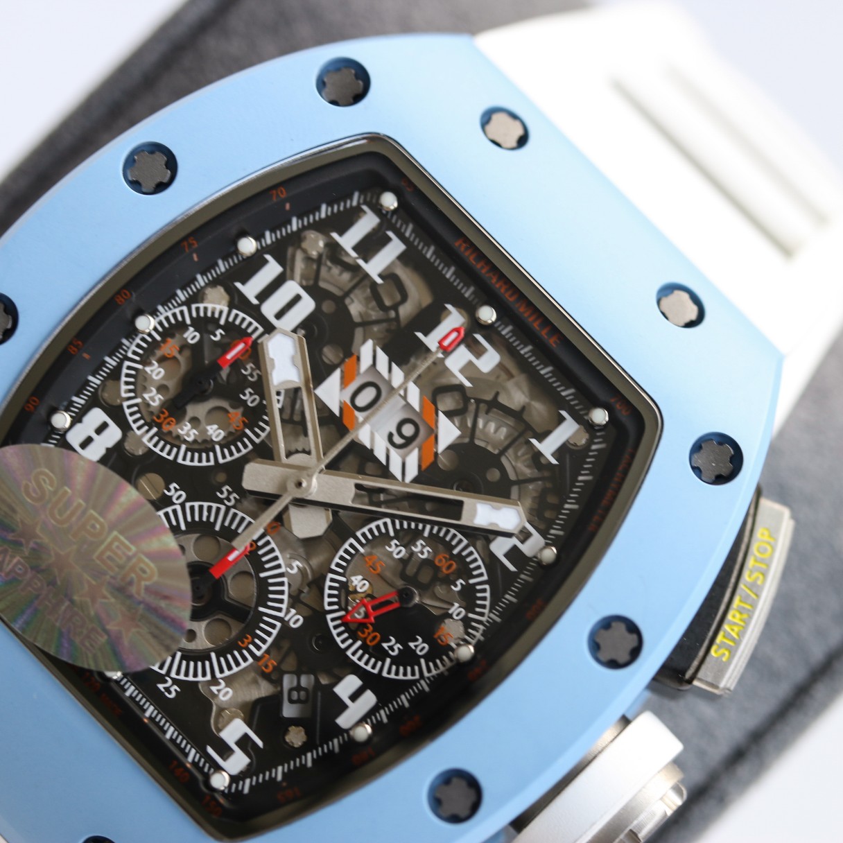 Richard Mille RM Series RM11-03 blue case white rubber strap chronograph dial detail view
