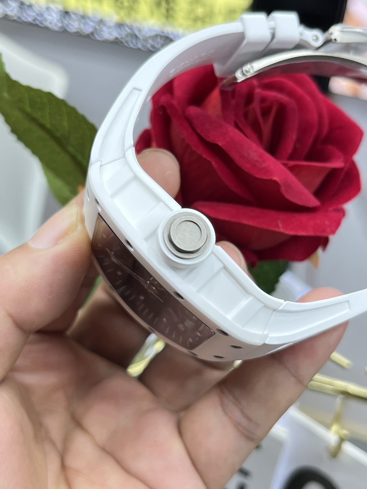 Richard Mille RM055 BBR white ceramic case white strap crown detail side close-up view
