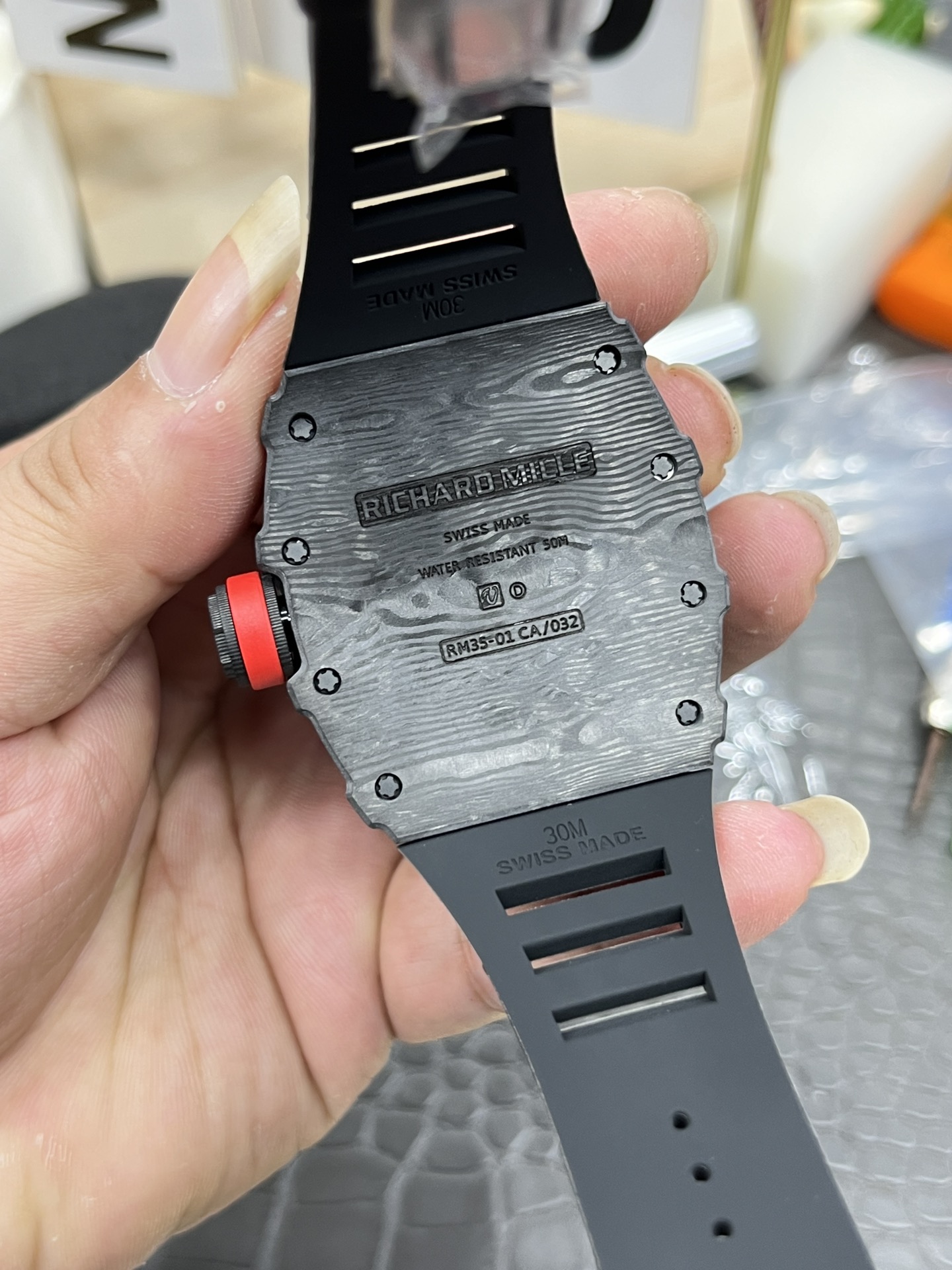 Richard Mille RM35-01 Rafa carbon fiber case black strap red crown engraved caseback detail view