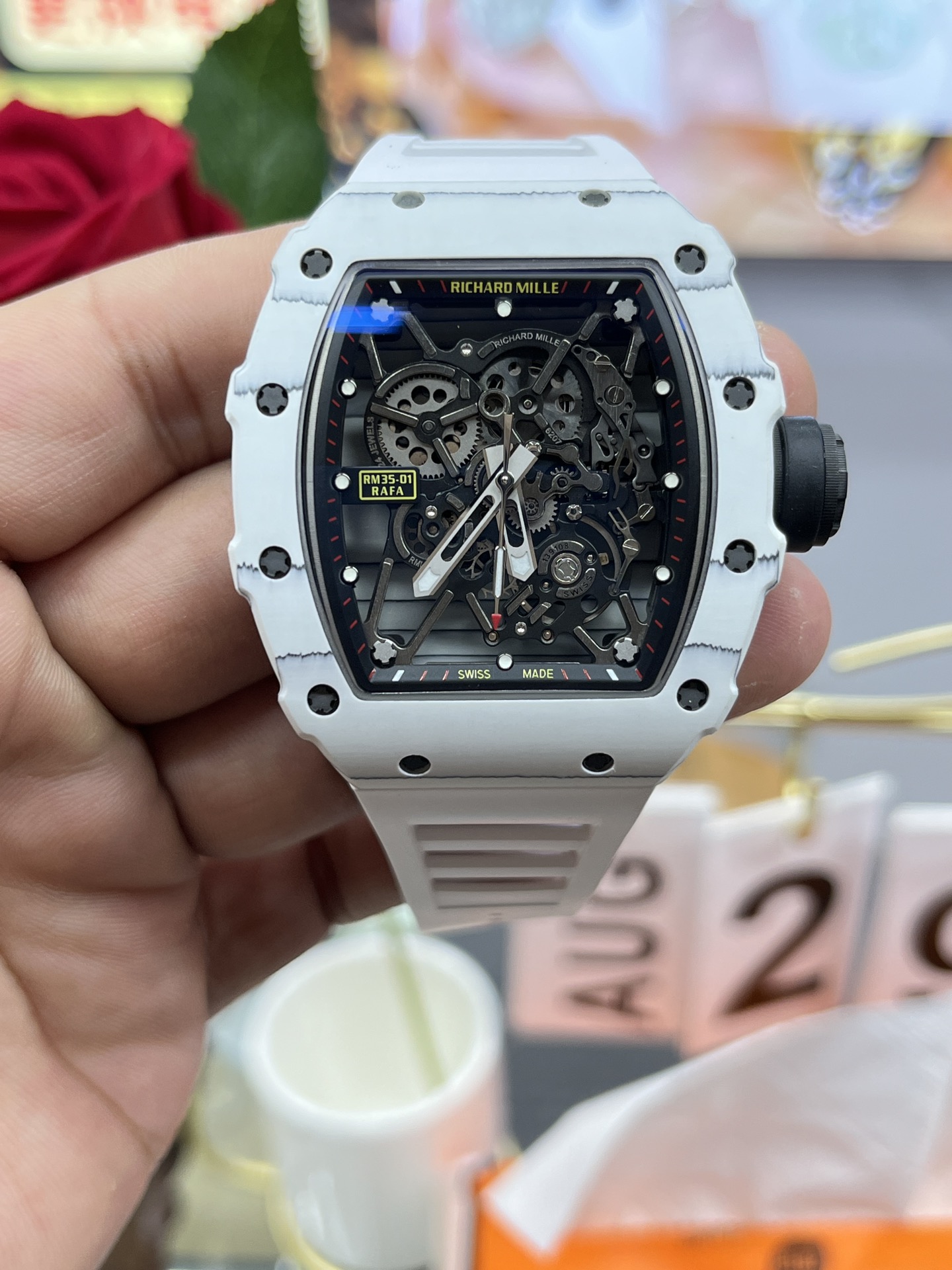 Richard Mille RM35-01 White Carbon Case Black Skeleton Dial White Rubber Strap Handheld Front View