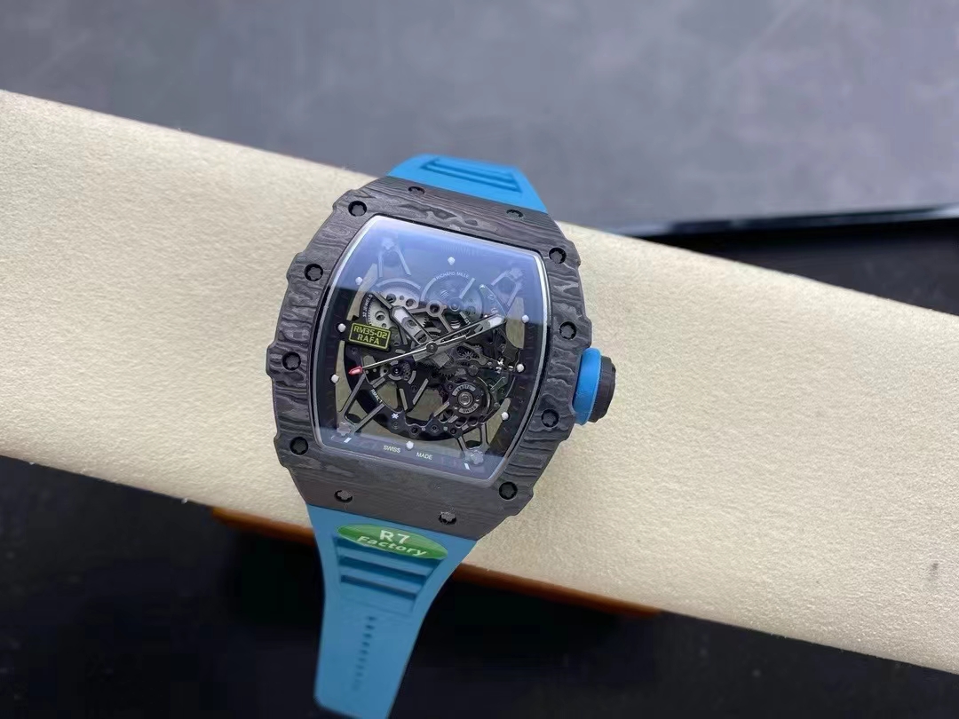 Richard Mille RM Series RM35-02 black NTPT carbon fiber case blue rubber strap angled wrist detail view