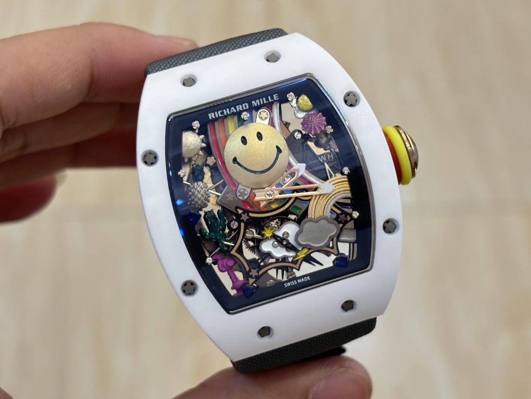 Richard Mille RM Series RM088 white case black strap smiley tourbillon watch handheld front view