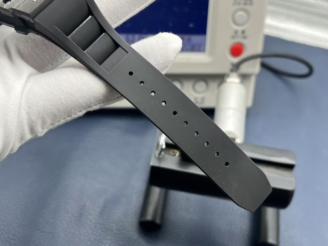 Richard Mille RM35-02 Rafael Nadal black rubber strap perforated adjustable design handheld strap close-up detail view