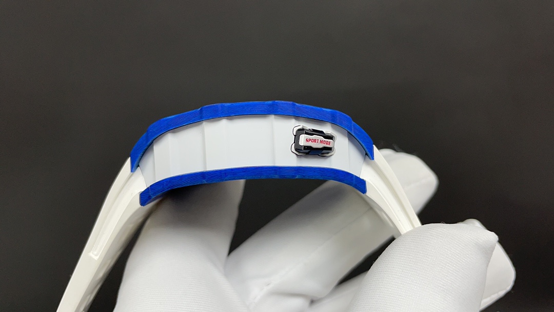 Richard Mille RM Series RM35-03 blue and white case white rubber strap button side detail view