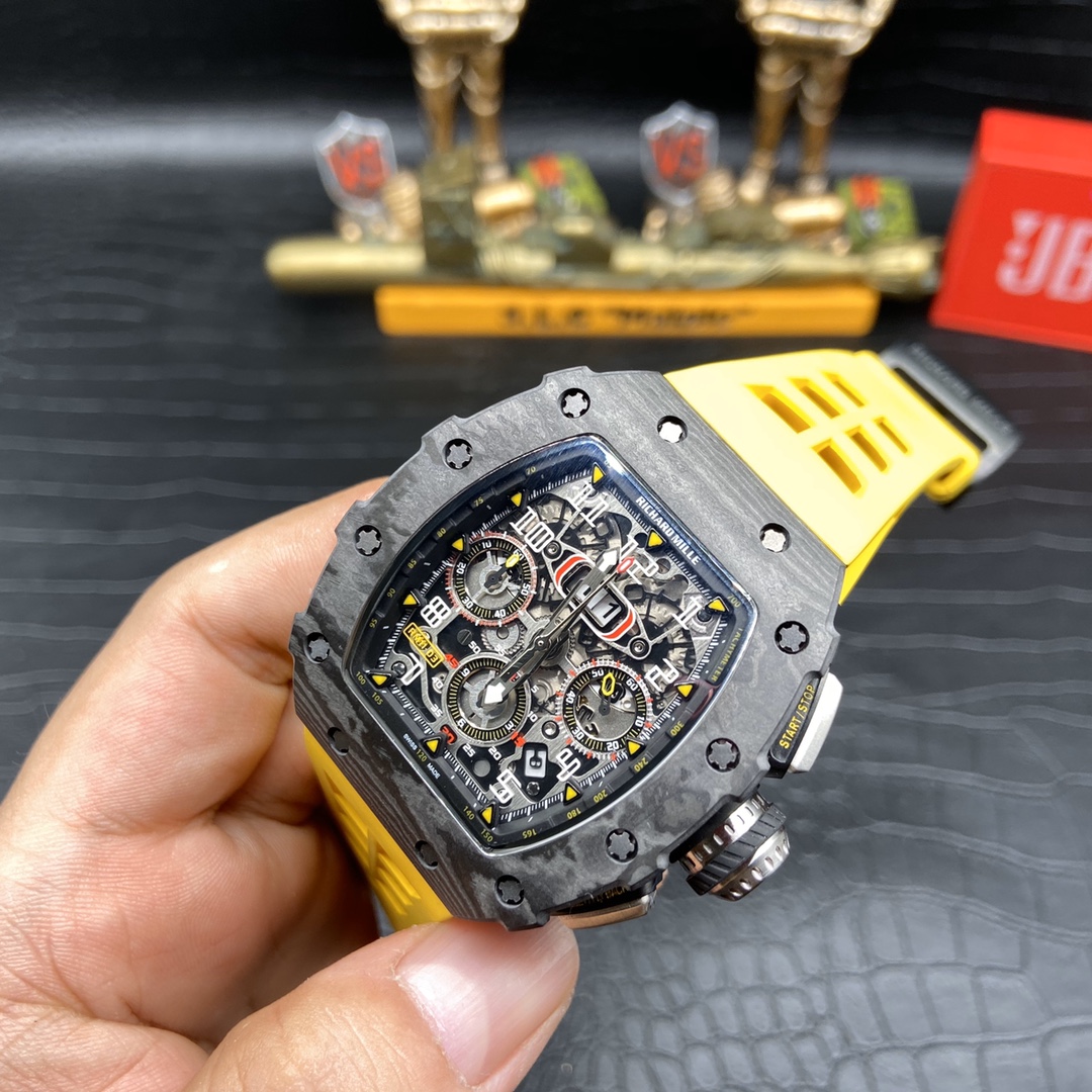  Richard Mille RM 011 Skeleton Dial Black Carbon Fiber Case Yellow Rubber Strap Handheld Angled Side View