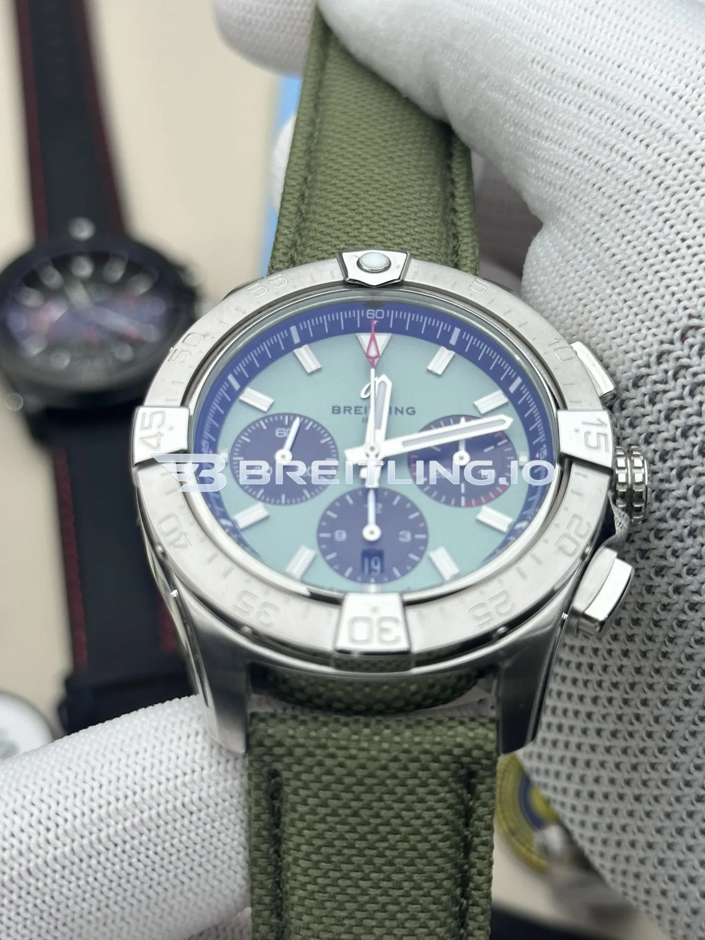 Breitling Avenger Chronograph 44 AB0147101L1X1 Green Dial Brushed Stainless Steel Bezel Army Green Fabric Strap Replica Dial Detail