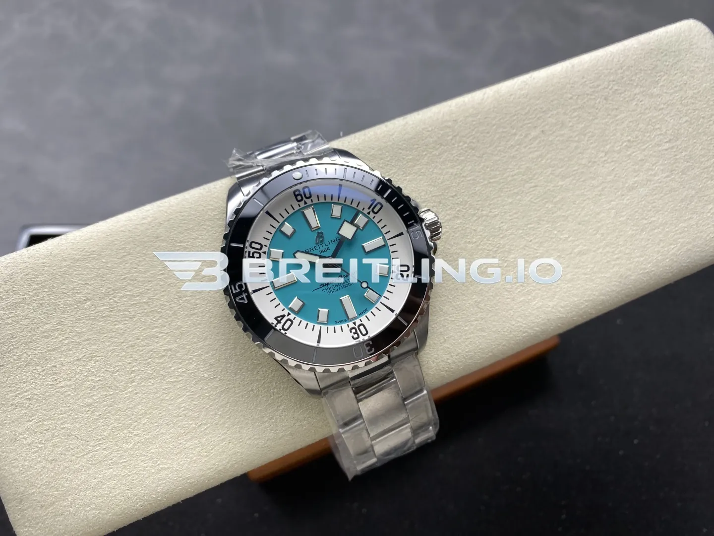 Breitling Superocean A17376211L2A1 44mm Turquoise Sunburst Dial White Inner Minute Track Black Ceramic Bezel Replica Side View