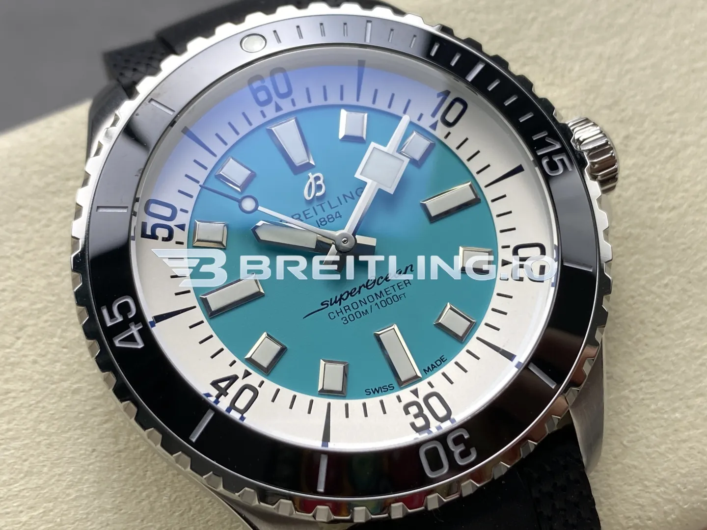 Breitling Superocean A17376211L2S1 44mm Turquoise Sunburst Dial White Inner Minute Track Black Ceramic Bezel Replica Dial Detail 1