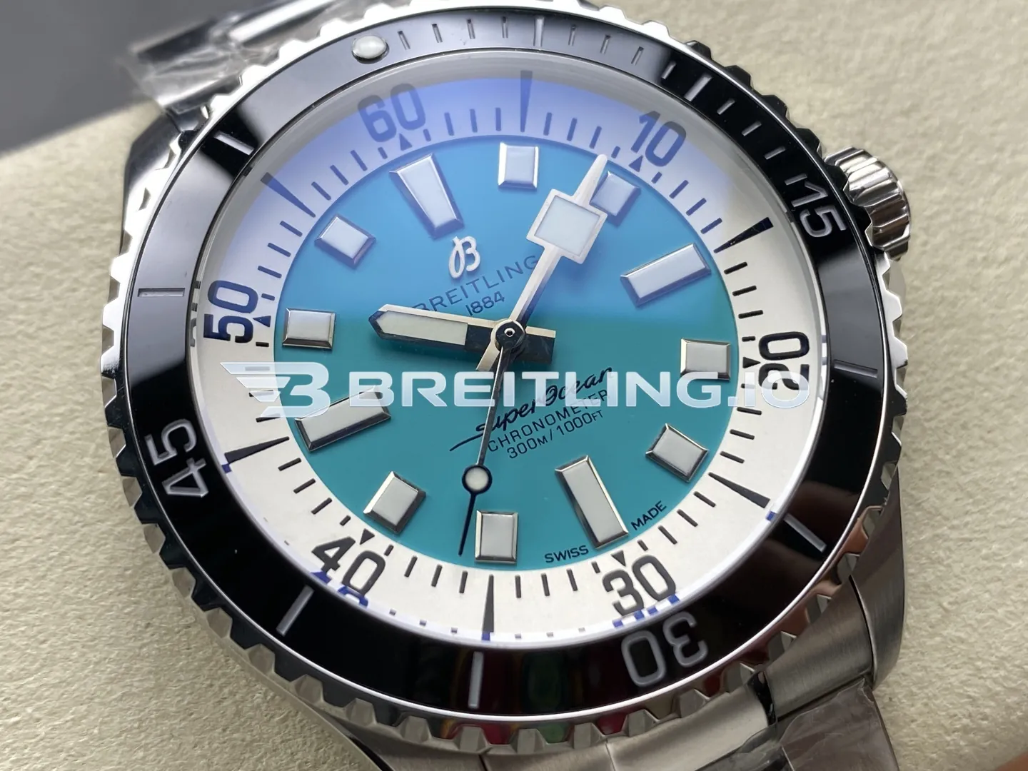 Breitling Superocean A17376211L2A1 44mm Turquoise Sunburst Dial White Inner Minute Track Black Ceramic Bezel Replica Dial Detail 1
