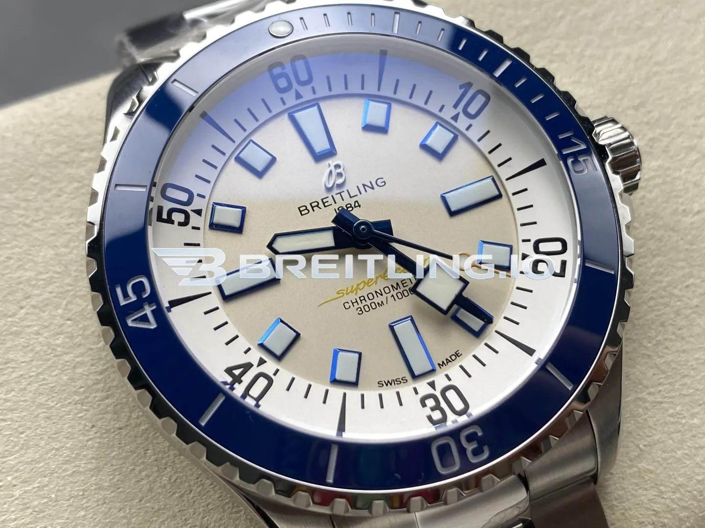 Breitling Superocean A17375E71G1A1 42mm Cream White Dial Blue Border Luminous Indices Blue Ceramic Bezel Replica Dial Detail 1