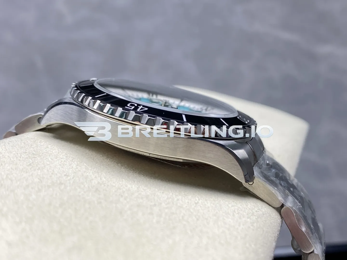 Breitling Superocean A17376211L2A1 44mm Turquoise Sunburst Dial White Inner Minute Track Black Ceramic Bezel Replica Left View