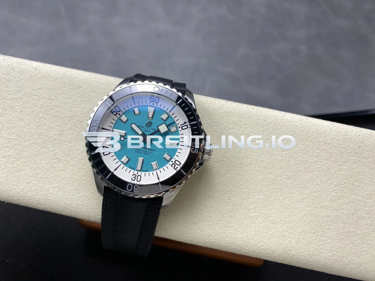 Breitling Superocean A17376211L2S1 44mm Turquoise Sunburst Dial White Inner Minute Track Black Ceramic Bezel Replica Side View 2