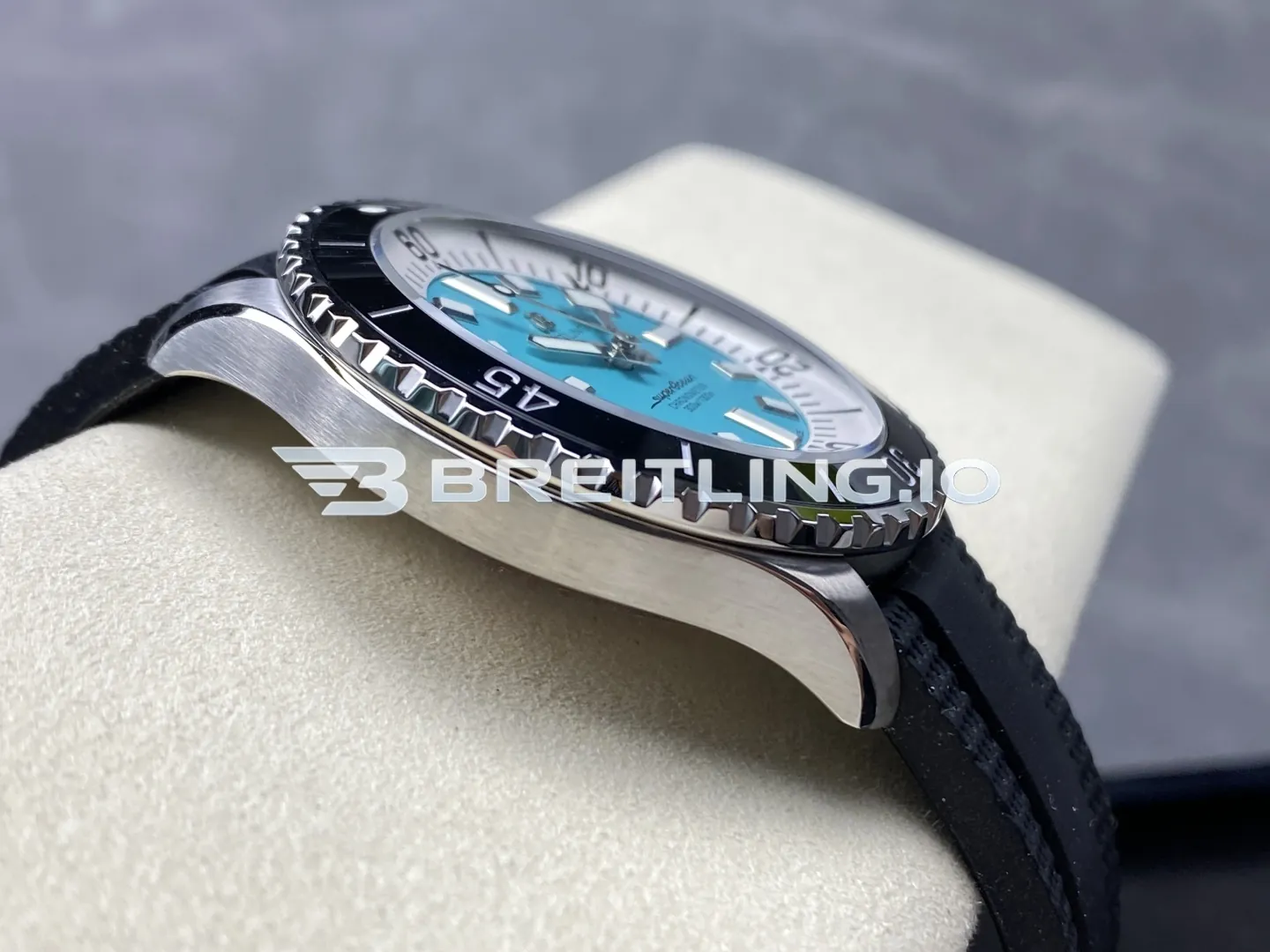 Breitling Superocean A17376211L2S1 44mm Turquoise Sunburst Dial White Inner Minute Track Black Ceramic Bezel Replica Left View