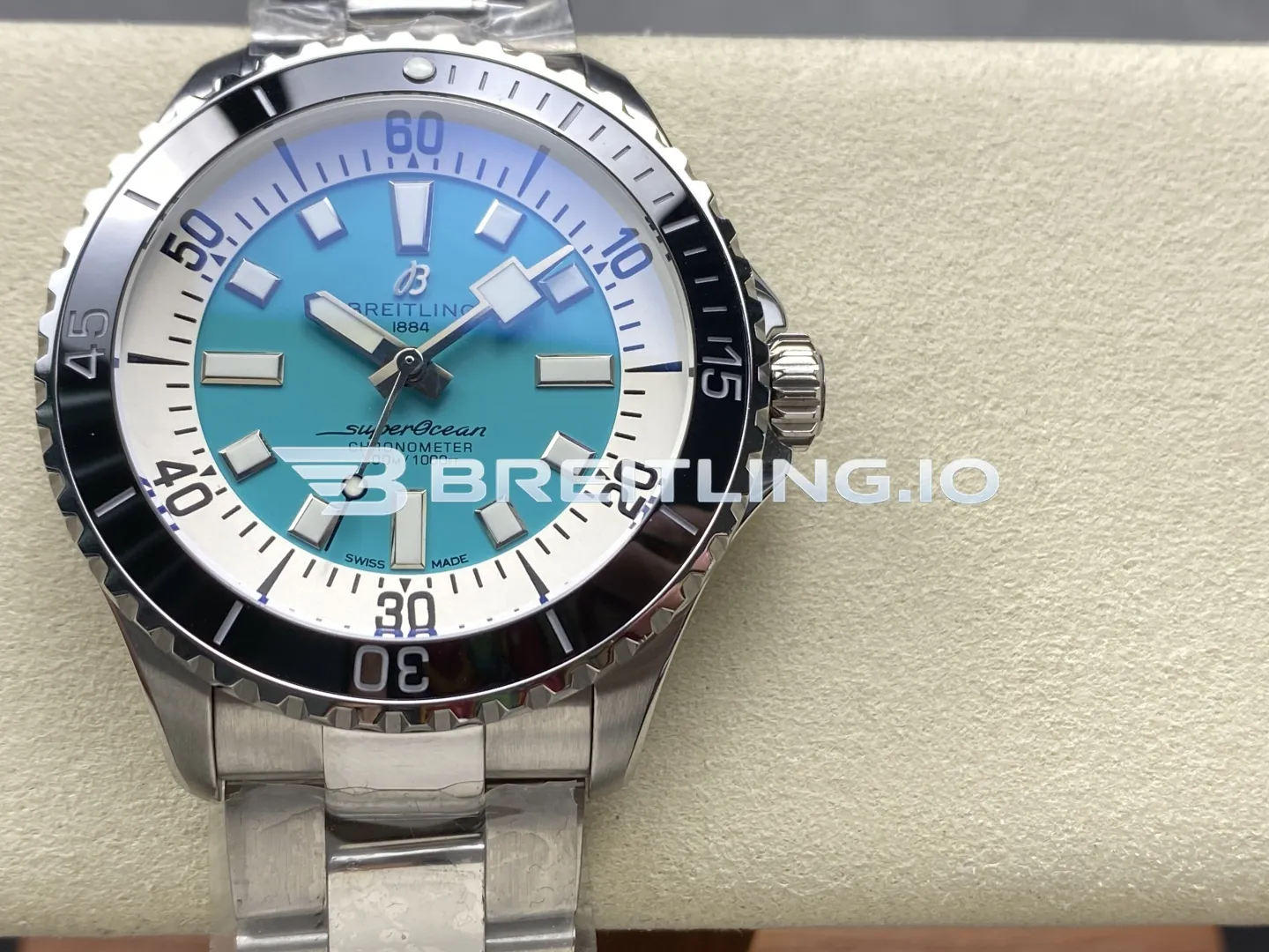Breitling Superocean A17376211L2A1 44mm Turquoise Sunburst Dial White Inner Minute Track Black Ceramic Bezel Replica Front View