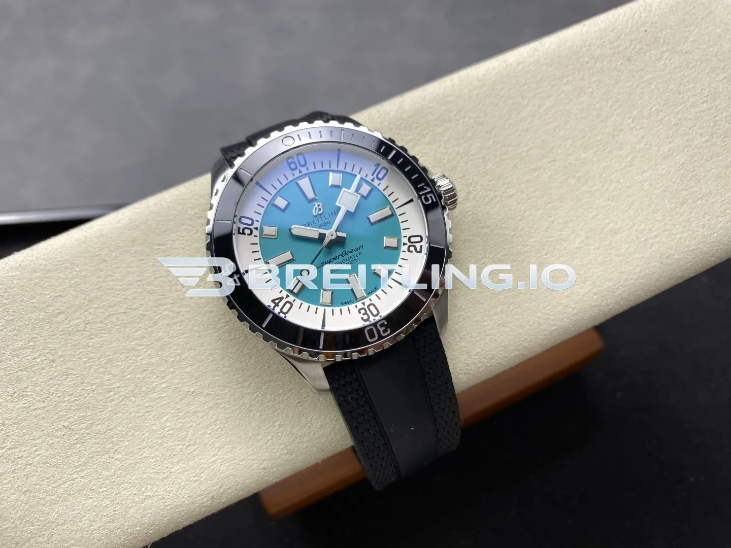 Breitling Superocean A17376211L2S1 44mm Turquoise Sunburst Dial White Inner Minute Track Black Ceramic Bezel Replica Side View 1