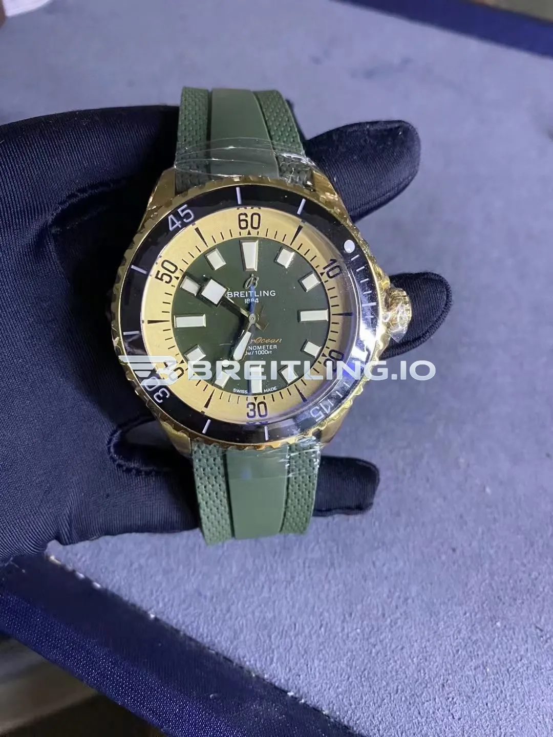 Breitling Superocean N17375201L1S1 42mm Military Green Sunburst Dial Solid 18K Yellow Gold Case Black Ceramic Bezel Replica Front View