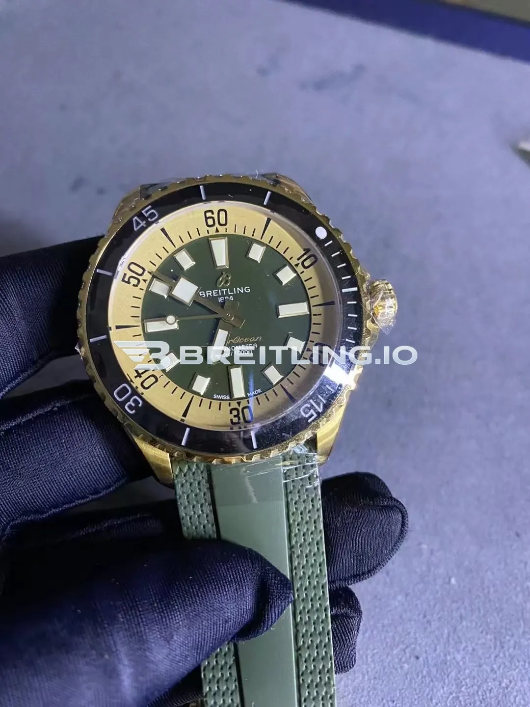 Breitling Superocean N17375201L1S1 42mm Military Green Sunburst Dial Solid 18K Yellow Gold Case Black Ceramic Bezel Replica Side View