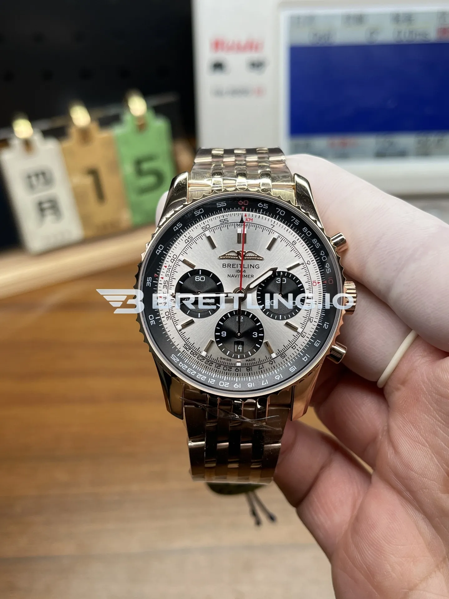 Breitling Navitimer RB0137241G1R1 46mm Silver Sunburst Chronograph Dial Solid 18K Rose Gold Case Flight Slide Rule Bezel Replica Front View