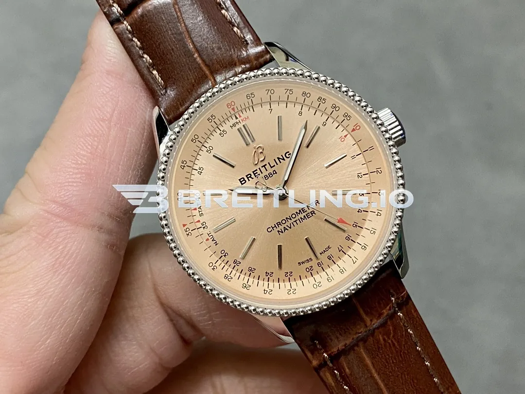 Breitling Navitimer A17395201K1P1 35mm Copper Sunburst Dial Stainless Steel Beaded Flight Slide Rule Bezel Replica Dial Detail 1
