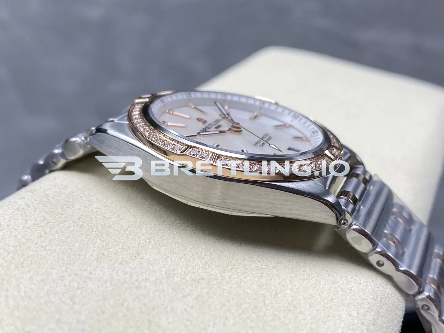 Breitling Chronomat U77310591A2U1 32mm White Mother-of-Pearl Diamond Hour Markers Two-Tone Steel & Rose Gold Diamond Bezel Replica Left View
