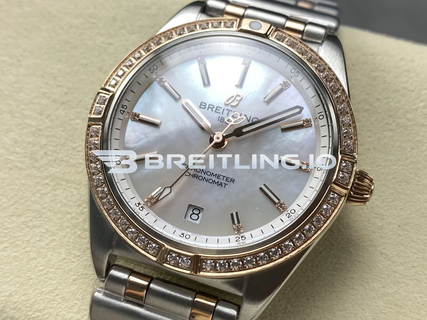 Breitling Chronomat U77310591A2U1 32mm White Mother-of-Pearl Diamond Hour Markers Two-Tone Steel & Rose Gold Diamond Bezel Replica Dial Detail 2