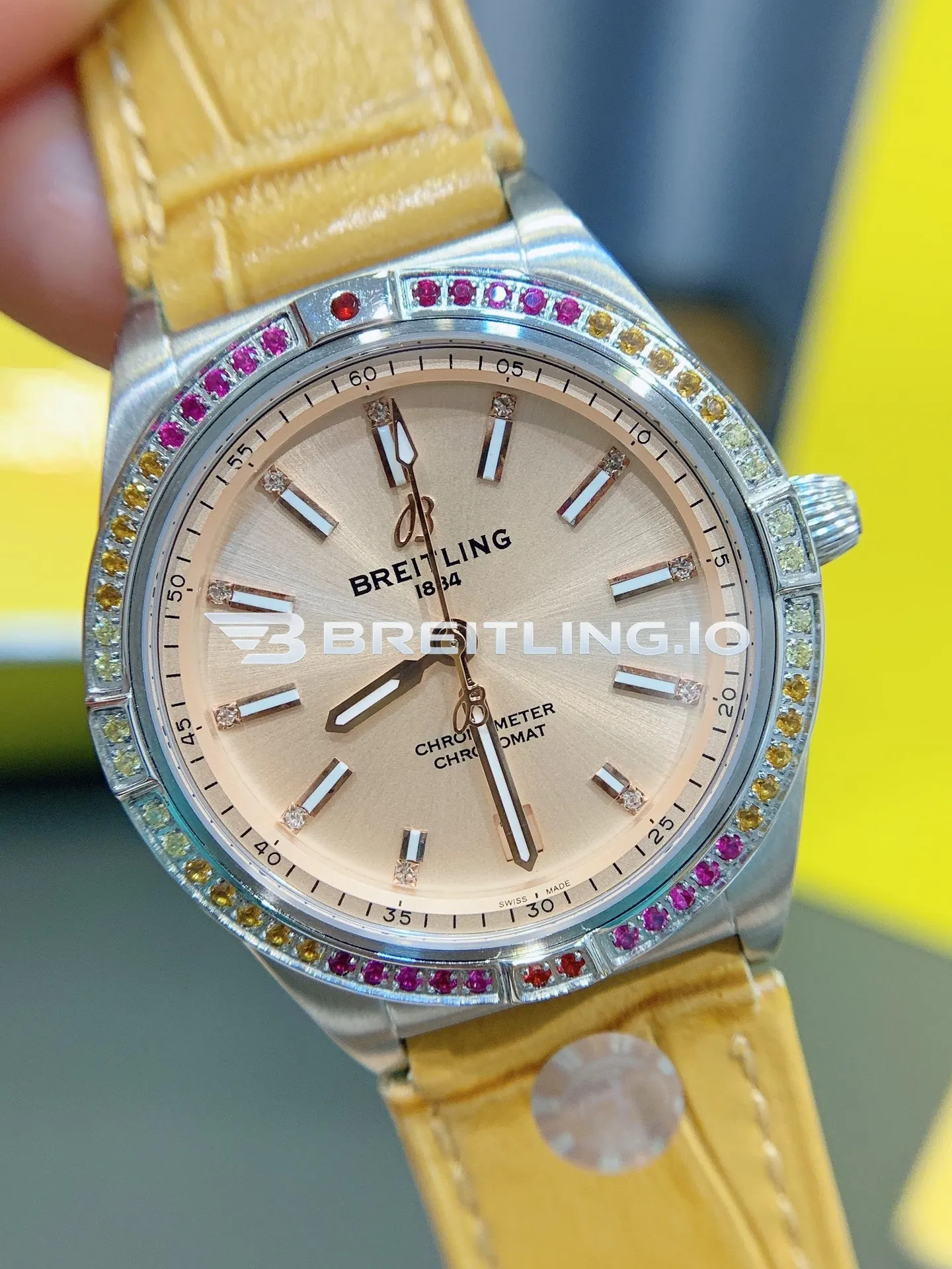 Breitling Chronomat A10380611A1P1 36mm Beige Sunburst Dial Rainbow Gradient Multi-Color Gemstone Tachymeter Bezel Replica Side View