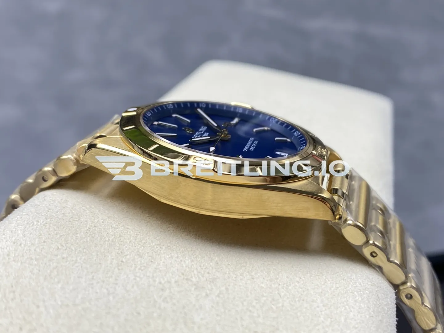 Breitling Chronomat K103801A1C1K1 36mm Deep Blue Sunburst Dial Polished 18K Yellow Gold Bezel Replica Left View