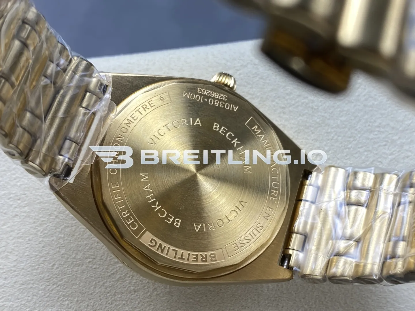 Breitling Chronomat K103801A1L1K1 36mm Mint Green Sunburst Dial Polished 18K Yellow Gold Fixed Bezel Replica Back View