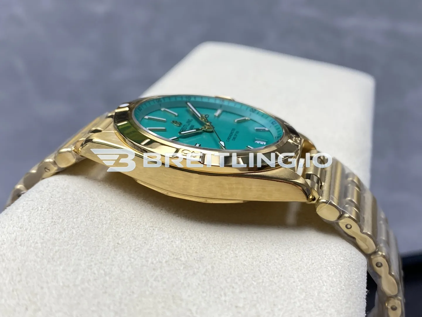 Breitling Chronomat K103801A1L1K1 36mm Mint Green Sunburst Dial Polished 18K Yellow Gold Fixed Bezel Replica Left View