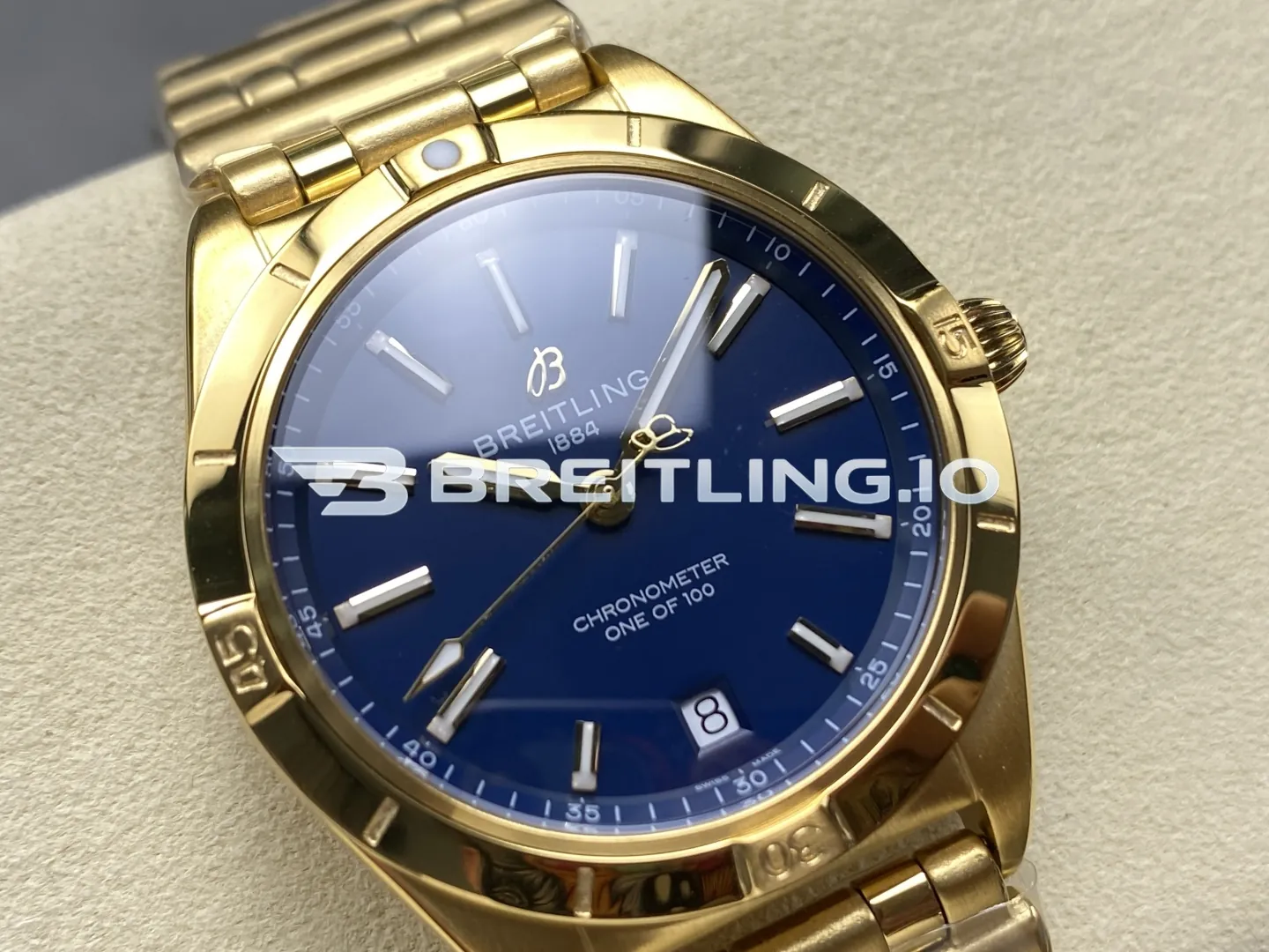 Breitling Chronomat K103801A1C1K1 36mm Deep Blue Sunburst Dial Polished 18K Yellow Gold Bezel Replica Dial Detail 1