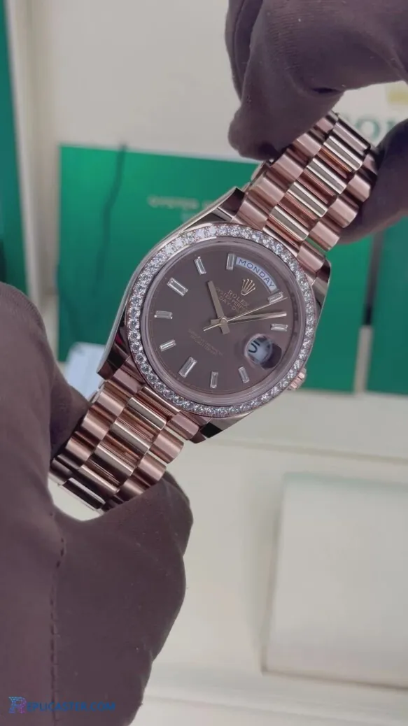Rolex Day-Date crown and bezel detail